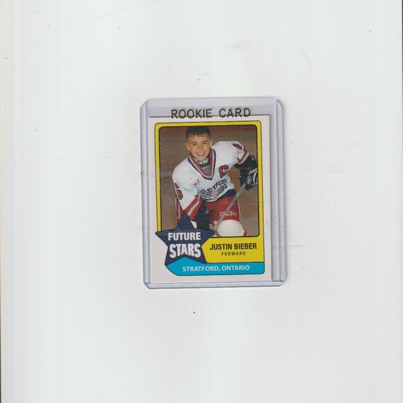 JUSTIN BIEBER SCARES HOCKEY ROOKIE CARD NEW.FREE SHIPPING - Picture 1 of 2